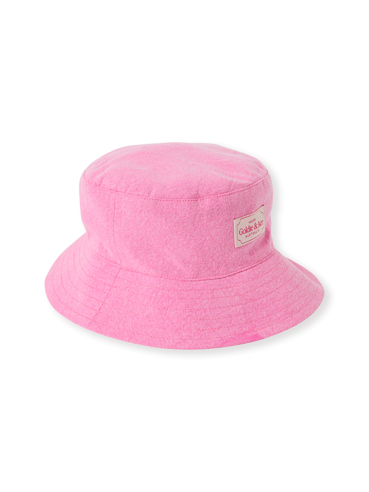 The Goldie + Ace Denim Bucket Hat in Pink Lemonade pictured on a transparent background. The material is cotton with cotton lining. It is a accessory made for babies, toddlers and kids.