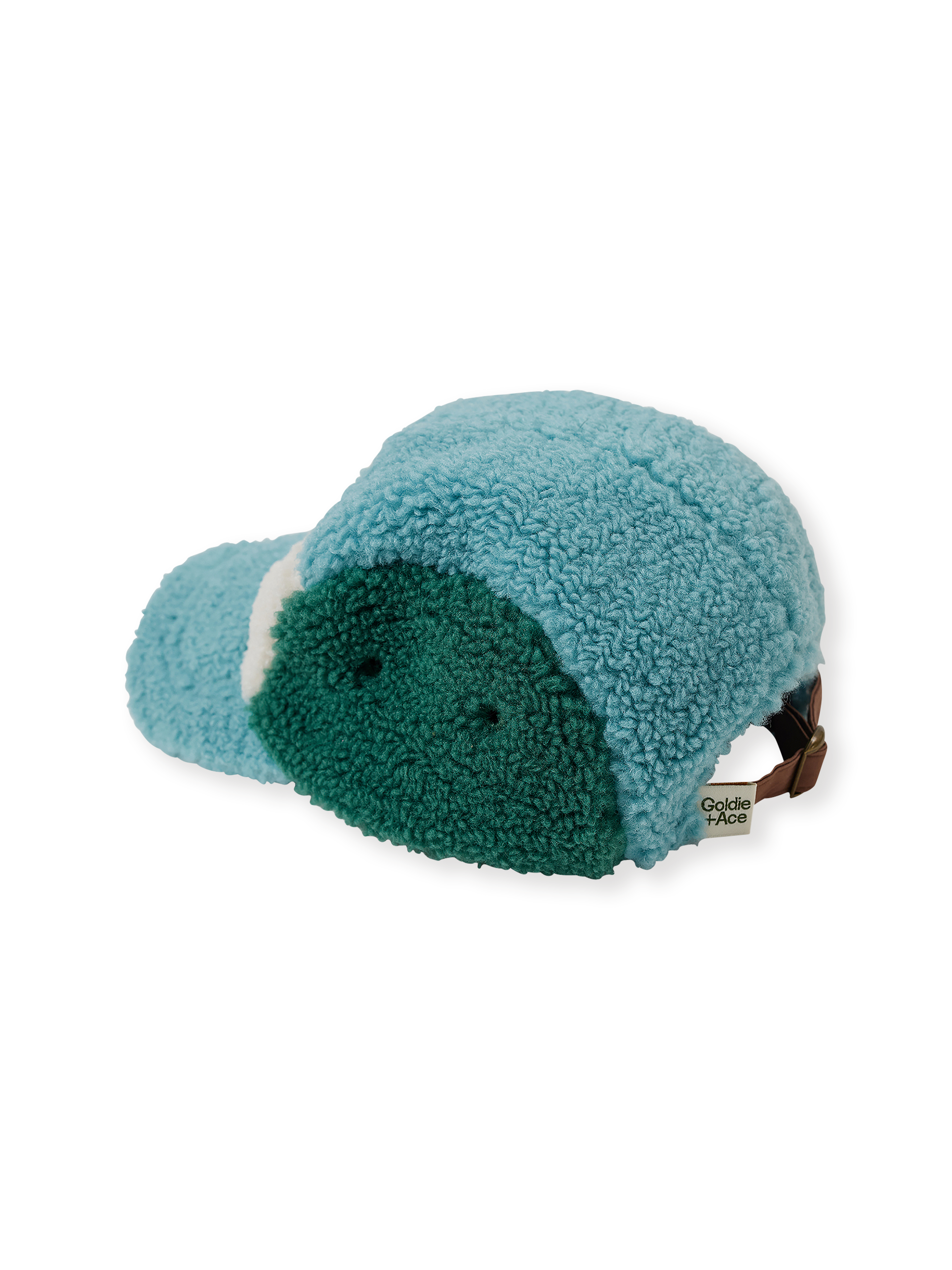 The Goldie + Ace Blair Sherpa Cap in Teal/Cream/Dark Jade pictured on a transparent background. The material is poly with cotton lining. It is a accessory made for babies, toddlers and kids.