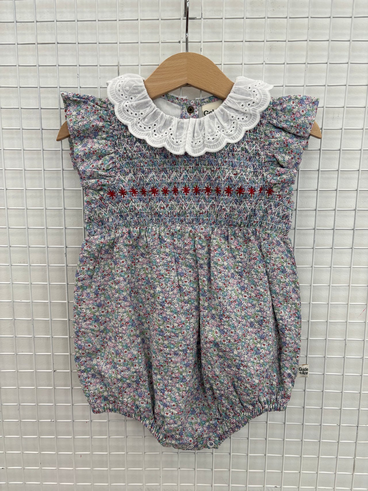 LANI SMOCKED ROMPER - FLOWER FIELD
