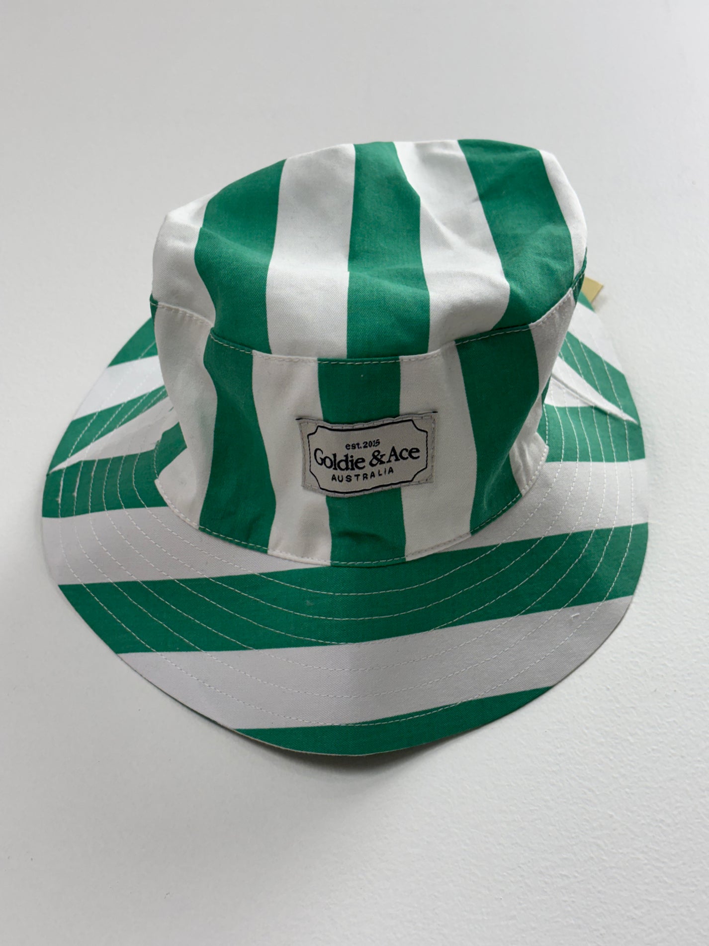HAPPY STRIPE BUCKET HAT