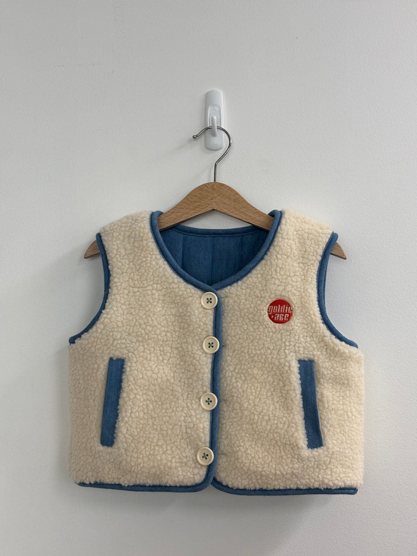 REVERSIBLE CHAMBRAY BUTTON VEST