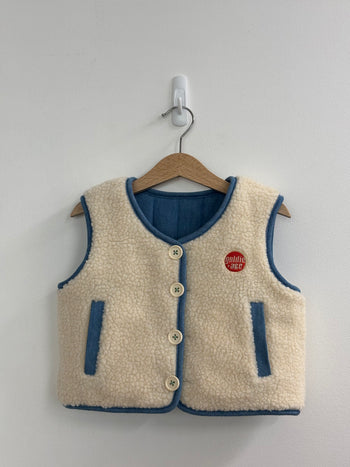REVERSIBLE CHAMBRAY BUTTON VEST